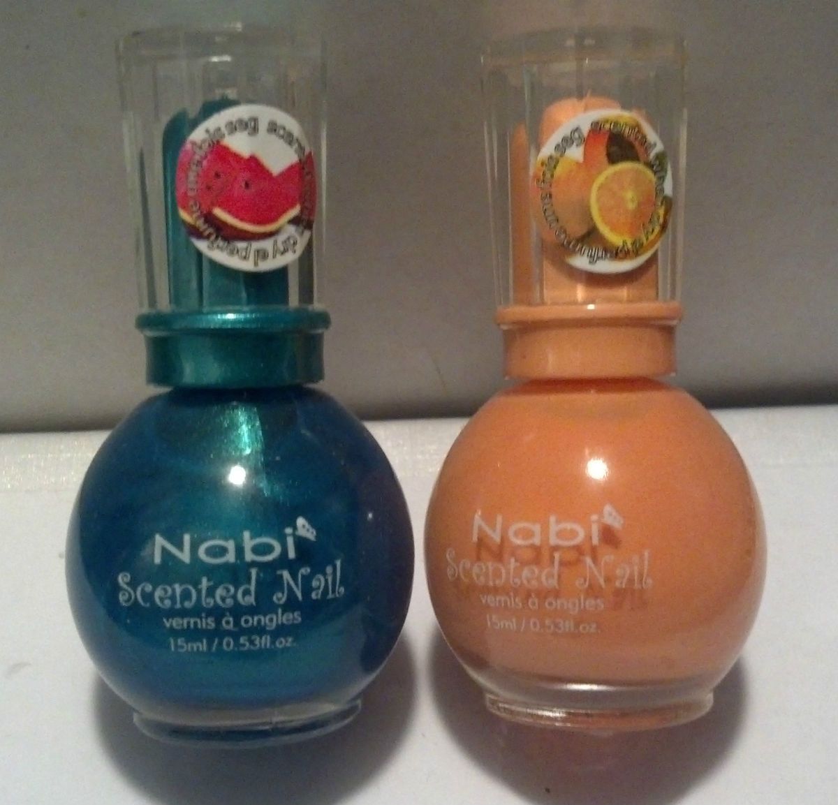 Lot of 2 New Scented Nail Polish by Nabi Teal Blue and Light Orange